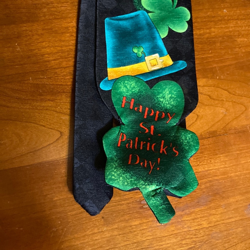 Look at the Irish tie. Black and green